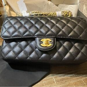 CHANEL Black Quilted Shoulder Bag with Gold Accents
